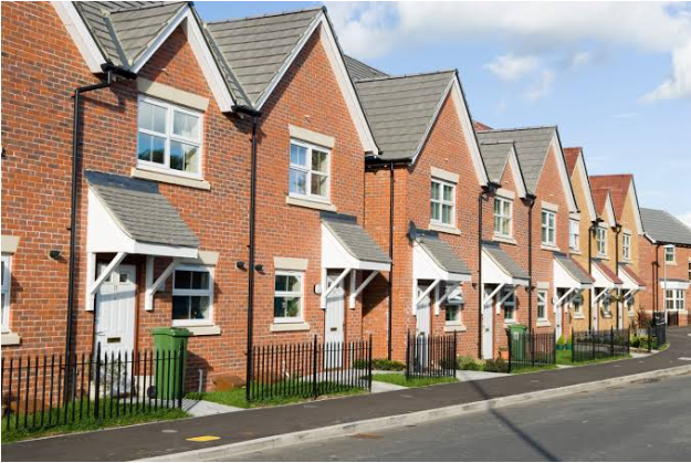 Row of new-build UK houses illustrating regional housing stock